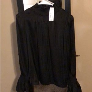 Solid black long bell sleeve top. NWT